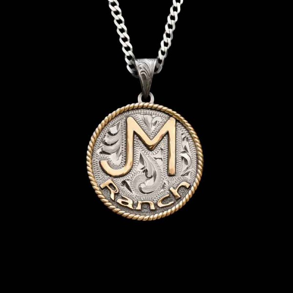 The Ranch Pride Custom Pendant can be customized with your Ranch Brand or Initials at no extra cost! Crafted on a German Silver base and detailed with a Jewelers Bronze rope edge.

Pair with a sterling silver chain to create full necklace set! Click her